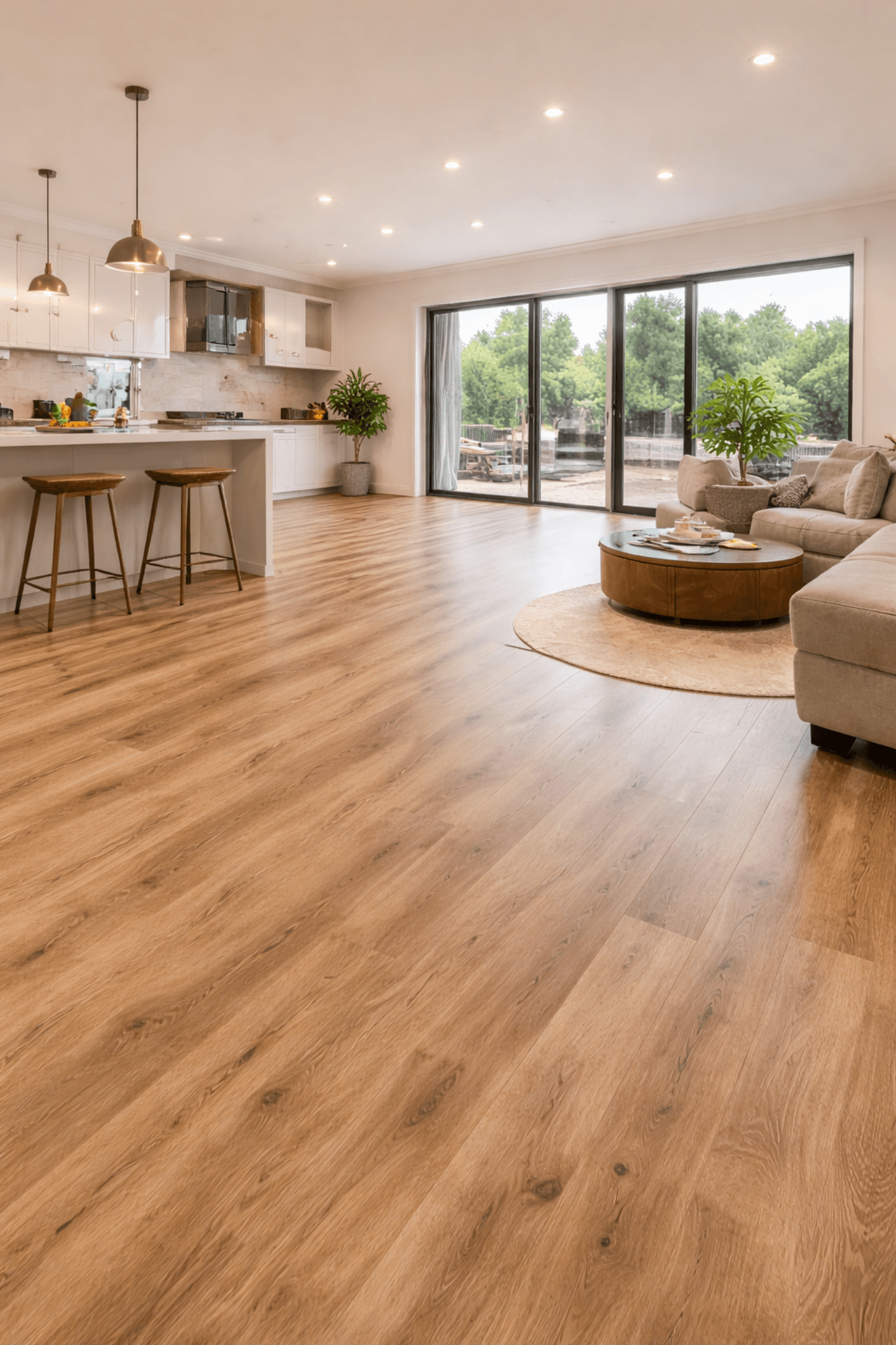 Dark oak hybrid flooring installed in a modern Melbourne living room